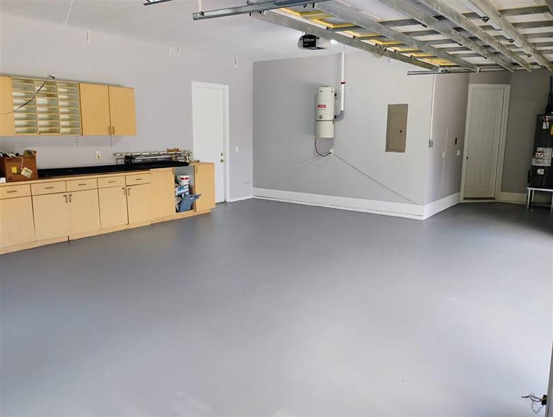 The same garage with a smooth gray epoxy floor
